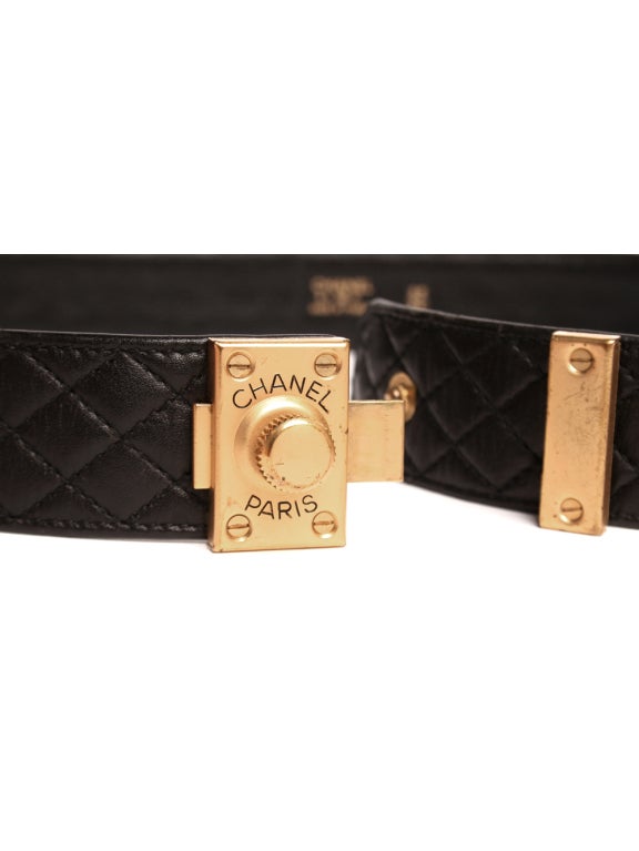 Secure your waist in sophisticated style with this Chanel leather belt. This quilted belt features gold twist knob hardware. Hardware had been affected throughout the years, but that only adds to its individuality.