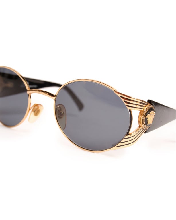 1990s Versace Round and Gold Ribbed Sunglasses 1