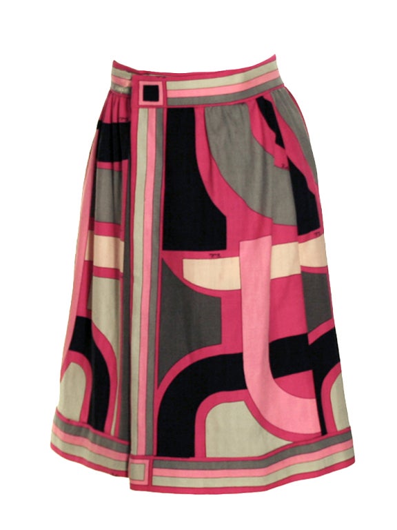 Graphic prints are this season’s hottest trends hence invest in this 1970's Emilio Pucci graphic print skirt. This piece showcases abstracts graphic prints that gifts this skirt an art deco fashion. Skirt is illuminated with fun combinations of