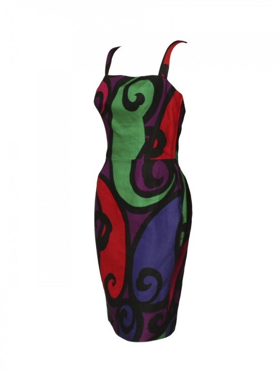 Turn up the volume in your wardrobe with this 1980's Balmain Ivoire swirl print dress.  Crafted from linen, this Balmain dress features a black, red, green and purple swirl print, side zipper opening and a square neckline.  With a pop of color you
