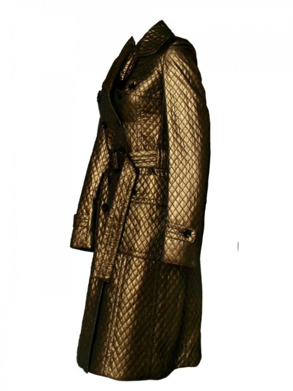 Our Burberry Prorsum Bronze Metallic Trench Coat is the best of its kind.  There is no doubt that this coat will last you forever and always achieve you compliments, with its gorgeous quilted fabric and very trending bronze color.  No matter what