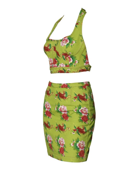 For the coolest and effortless way to work florals look no further and invest in this 1990s Todd Oldham Jeans bustier, mini and jacket set. With the right styling, Oldham’s set can be worn as separates. Illuminated in lime green hues with red and