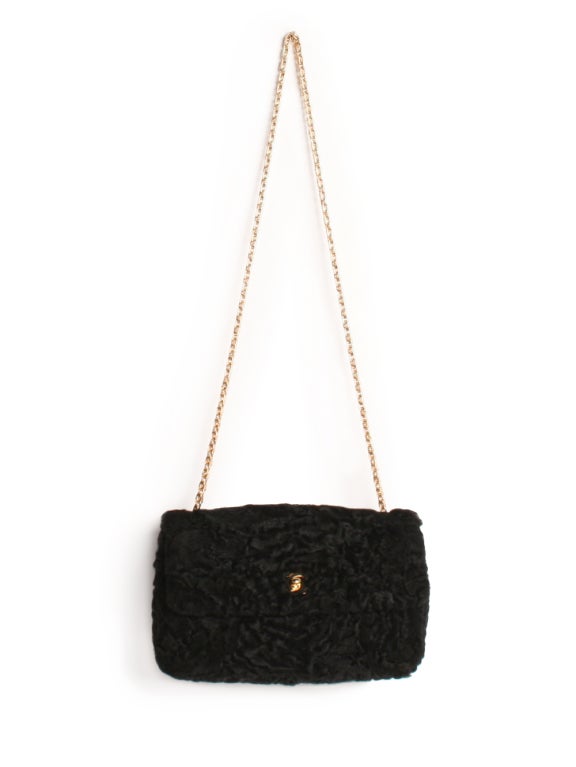 Choose Chanel's Persian lamb shoulder bag for the ultimate ladylike appeal to any outfit. Illuminated in dark black, this must have shoulder-bag is set make heads turn. This refined accessory makes an stylish accompaniment to any look.
