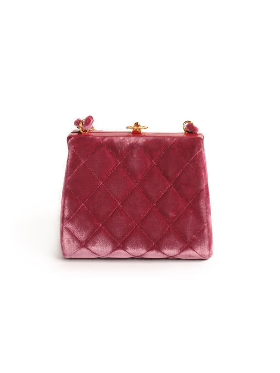 Sophisticated and compact, Chanel's quilted velvet shoulder-bag will be a timeless addition to your wardrobe. Small shoulder-bag features a quilted velvet structure throughout the surface of the piece, gold interlocking C's lock and interior pocket