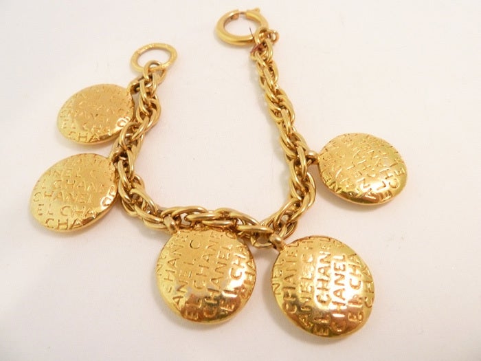 Vintage Signed Chanel Charms Bracelet In Excellent Condition For Sale In New York, NY