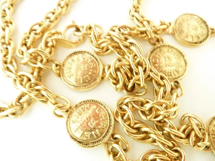 Women's LONG Vintage Classic Signed Golden Chanel Medallion Sautoir For Sale
