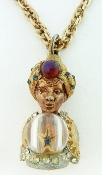 This is the famous vintage signed Har genie pendant with red, white and blue rhinestones in a gold-tone setting.  In excellent condition, this pendant measures 1 7/8” x 7/8”; the necklace is 26” x 1/4” with a spring closure.  In excellent condition,