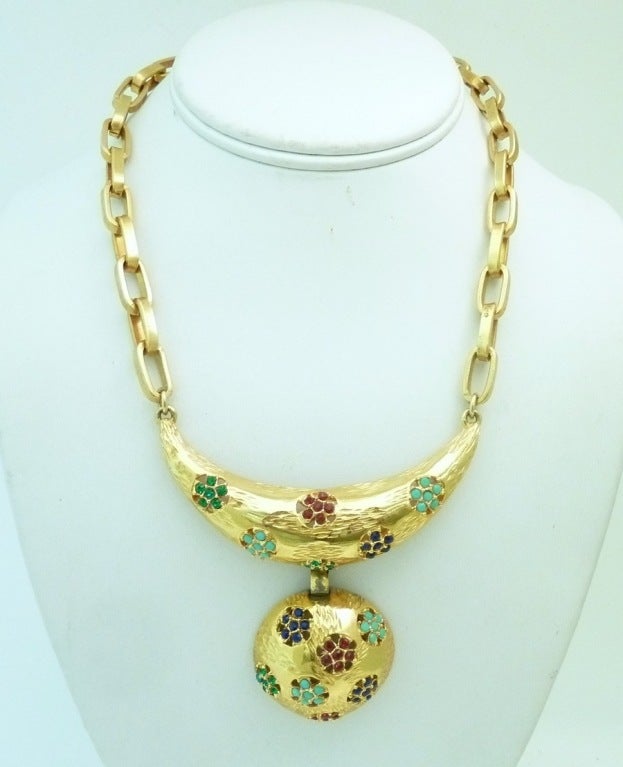 This vintage signed Lucian Picard necklace features green, red and turquoise color rhinestones in a gold-tone setting.  The necklace measures 17” with a front drop of 2 1/4” and a spring closure.  In excellent condition, this necklace is signed