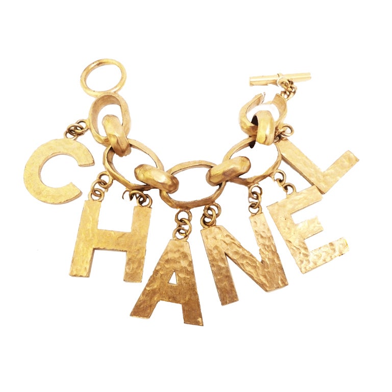 Large Vintage Chanel 93P Charm Bracelet For Sale