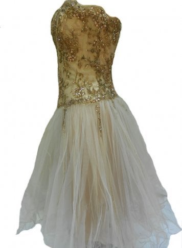 Unique piece couture.
Short gold laced, corseted beaded bustier with multi-tulle circle shirt