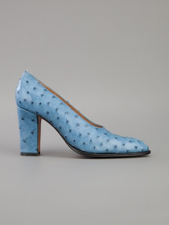 Blue ostrich leather pumps from Hermes featuring an almond toe, a slip on fit, a raised dark blue spot print and a mid height block heel.

Size: Italian 36
Heel: 8.5cm

Returns Policy: Final Sale - No Returns.

All of our items are shipped