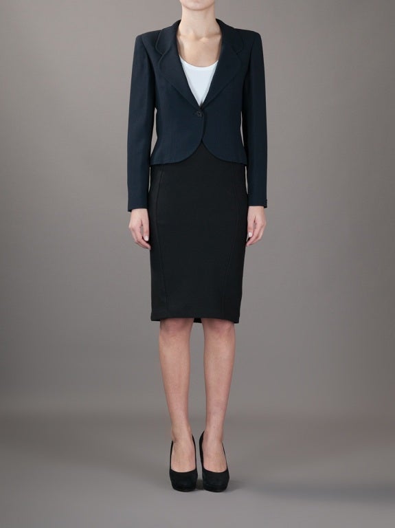 This navy silk blend blazer by Chanel Vintage is tailored with notched lapels, a single button front fastening, long sleeves and a fitted cut.

Size: FR 36

Returns Policy: Final Sale - No Returns.

All of our items are shipped from the UK, as