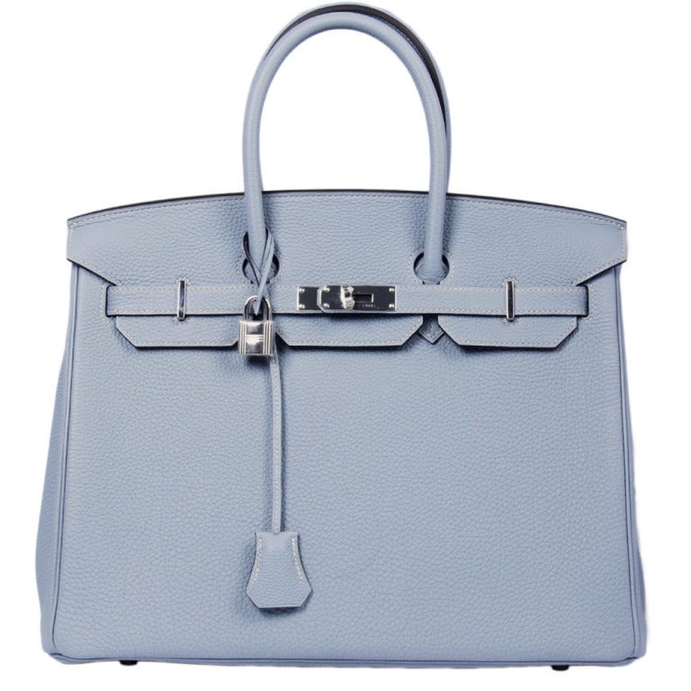 Brand new Hermes Birkin Bag in Bleu Lin (new colour 2013) with palladium hardware. This Bag comes with it's original lock and key, protective felt, dustbag, raincoat and box. The hardware still has it's protective covering.

Colour: Bleu