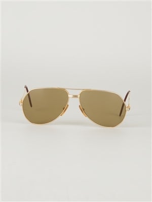 Gold-tone aviator frame sunglasses from Cartier Vintage featuring light yellow frames, a double bridge and skinny arms. 

Colour: Gold, yellow

Material: Glass, metal

Measurements: arm length: 13cm, lens diameter: 6cm, bridge width: