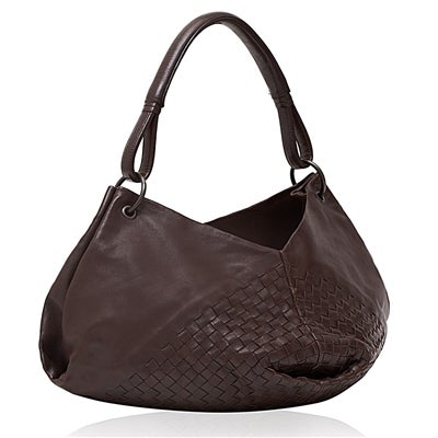 Brown leather shoulder bag from Bottega Veneta featuring woven details, gunmetal hardware and a tan suede lining including a zipped compartment.

Material: Leather

Measurements:  W: 40cm H: 21cm D: 31cm Handle Drop: 18cm

Returns Policy: