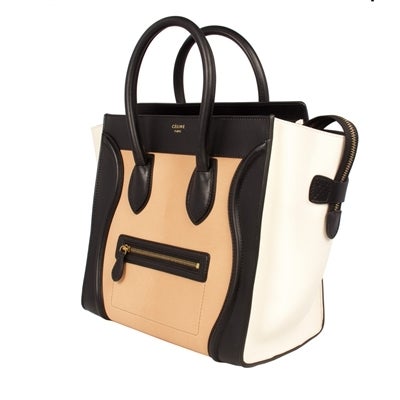 Celine colour-block tote bag in dusty peach, cream and black. Crafted from leather, this bag is branded with with 'CELINE PARIS' and includes its original dustbag. 

Measurements: W: 30 cm H: 30 cm D: 17 cm   

Material: Leather

Condition: