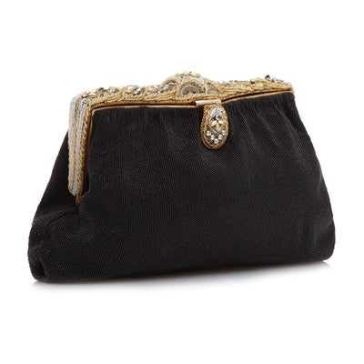 1920's vintage beaded evening bag featuring ornately beaded detail on the top of the bag and on the latch. The interior of the bag is lined in black satin. Handmade in France.

Material: fabric, metal, vintage beads

Measurements: W: 22cm H: