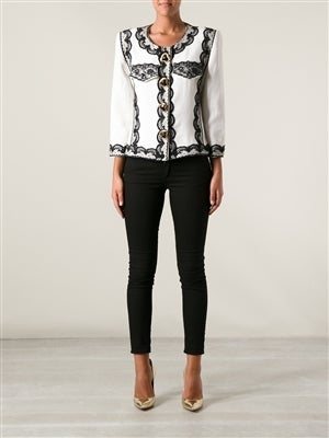 White linen blend Christian Lacroix jacket from the Suzy Menkes Collection, accented with a contrast lace trim and featuring a round neck, gold-tone heart-shaped button fastenings at the front, three-quarter length sleeves and pointed