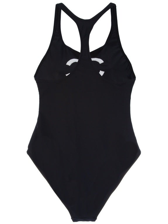 Black swimming suit from Chanel Vintage featuring a round neckline, a racer back and white designer embossing on front.

Returns Policy: Final Sale - No Returns.

All of our items are shipped from the UK, as a result you may be liable for any