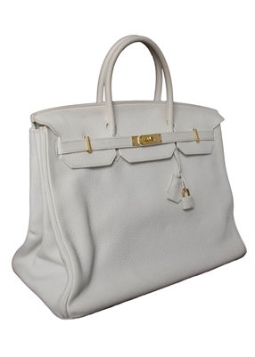 Hermes Birkin Bag, White, 40 cm with gold-tone hardware and matching, white stitching. Hermès bags are considered the ultimate luxury item the world over. Hand stitched by skilled craftsmen, waiting lists of a year or more are