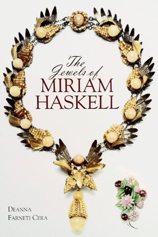 Fine and rare vintage Miriam Haskell prototype brooch. Signed brooch prominently featured in The Jewels of Miriam Haskell book (Deanna Farneti Cera) page 156. Gilt metal item features vivid chartreuse velvet centers and Swarovski crystals. Original