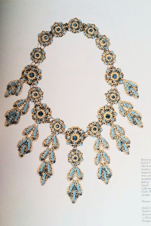 Fine and rare vintage Miriam Haskell prototype Festoon necklace. Necklace prominently featured in The Jewels of Miriam Haskell book (Deanna Farneti Cera) page 181. Signed gilt metal item with pate de verre glass faux sapphires and turquoise with