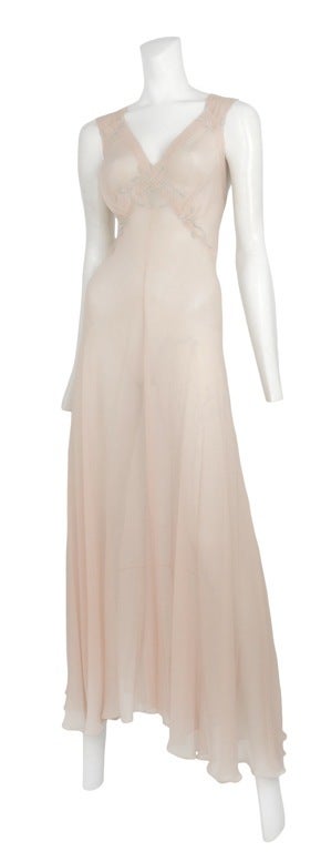 Ballet pink chiffon 2pc robe and gown. Robe has self sash waist belt and thin soft blue  satin tie at neck. The gown has a delicate soft blue rosebud embroidery at bust.