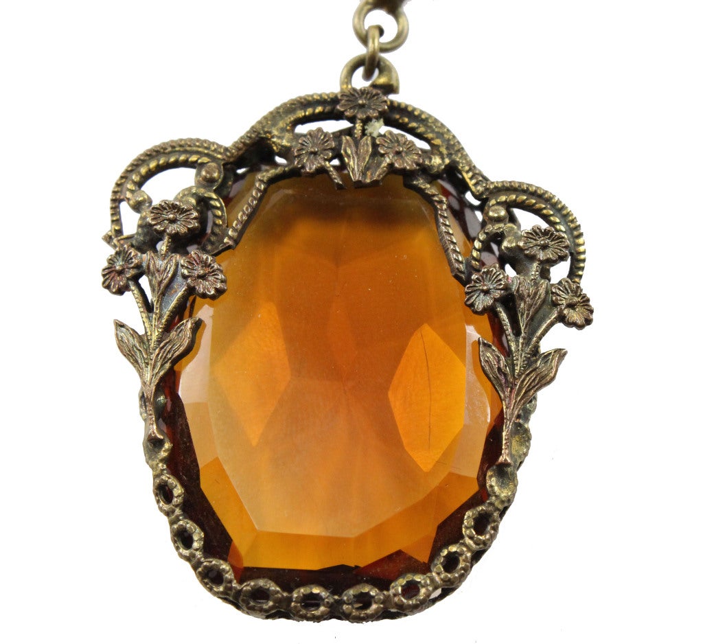 1930's Czech gold open chain with rhinestones and embellishments throughout, large amber crystal surrounded by gold filigree