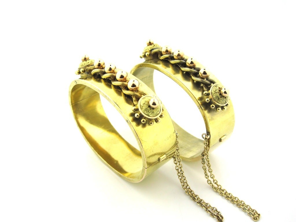 A Pair Of Matching Gold Victorian Hinged Bangle Bracelets