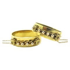 A Pair Of Matching Gold Victorian Hinged Bangle Bracelets