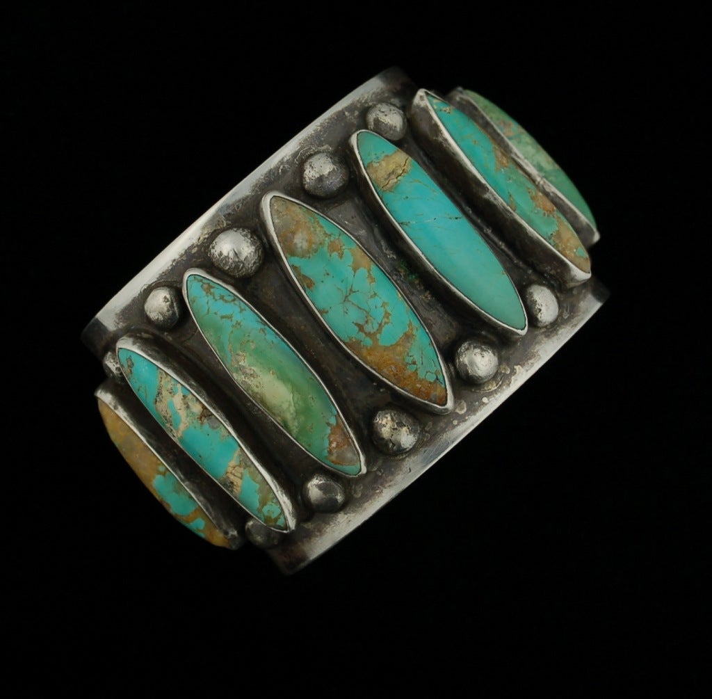 Superlative quality heavy Navajo and Turquoise cuff bracelet. This cuff is a brilliant example of Navajo jewelry from the 