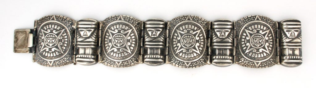 Superior piece by Mexican silversmith Carlos Avila in Mexico City. This bracelet is a work of art, impeccable craftsmanship. The design depicts stylized depiction of the Aztec calendar (not to be confused at all with Mayan calendar glyphs). The long