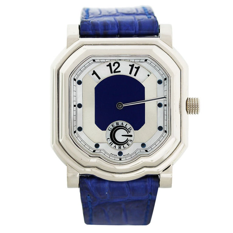 Brand: Gerald Charles by Gerald Genta
Style: GC 39 A-Evolution White Gold Automatic Sliding Hour Watch
Gender: Mens
Case Material: 18k White Gold
Dial: Silvered with Mother-of-Pearl and Blue Lapis
Bracelet: Blue Leather
Movement: