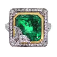 Anello in platino con smeraldo naturale e diamante naturale aureolato Vintage By in stock