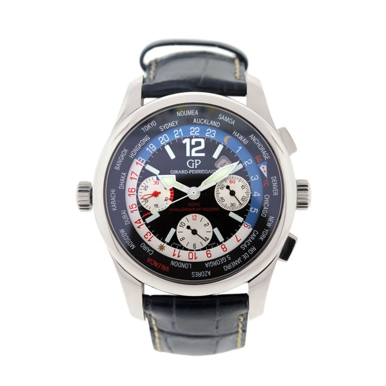 This stainless steel Girard Perregaux American's Cup LTD wristwatch is a limited edition model, Ref. 49800 WW.TC. The dial is a white, blue and navy blue chronograph dial. The movement is mechanical. The leather strap is dark navy blue with an
