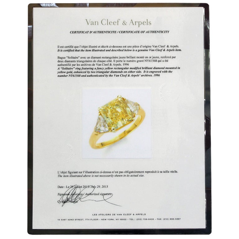 Van Cleef & Arpels Fancy Yellow Radiant Cut Diamond Engagement Ring In New Condition In Boca Raton, FL