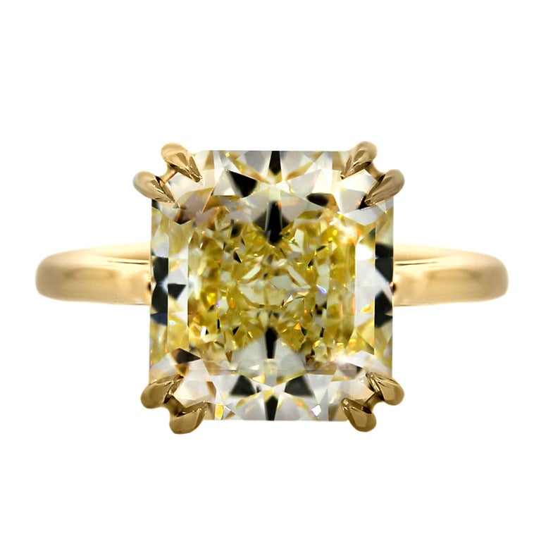 Diamond engagement rings with yellow diamond