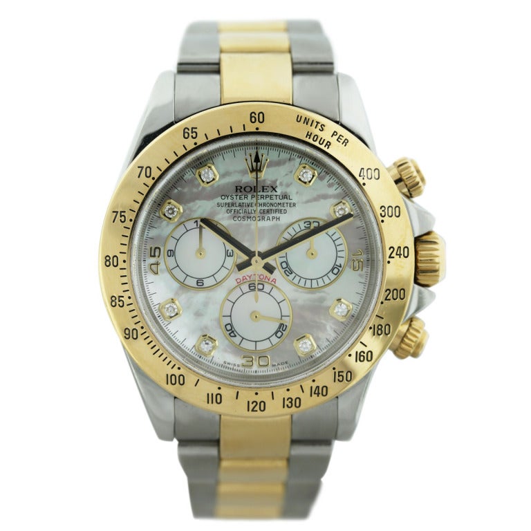 Brand: Rolex
Model: Daytona
Ref: 116523
Case Material: Stainless Steel
Case Diameter: 40 mm
Bezel: 18k Yellow Gold Fixed
Bracelet: Stainless Steel and 18k Yellow Gold Oyster with Deployment Clasp
Dial: Mother-of-Pearl with Diamond Dial