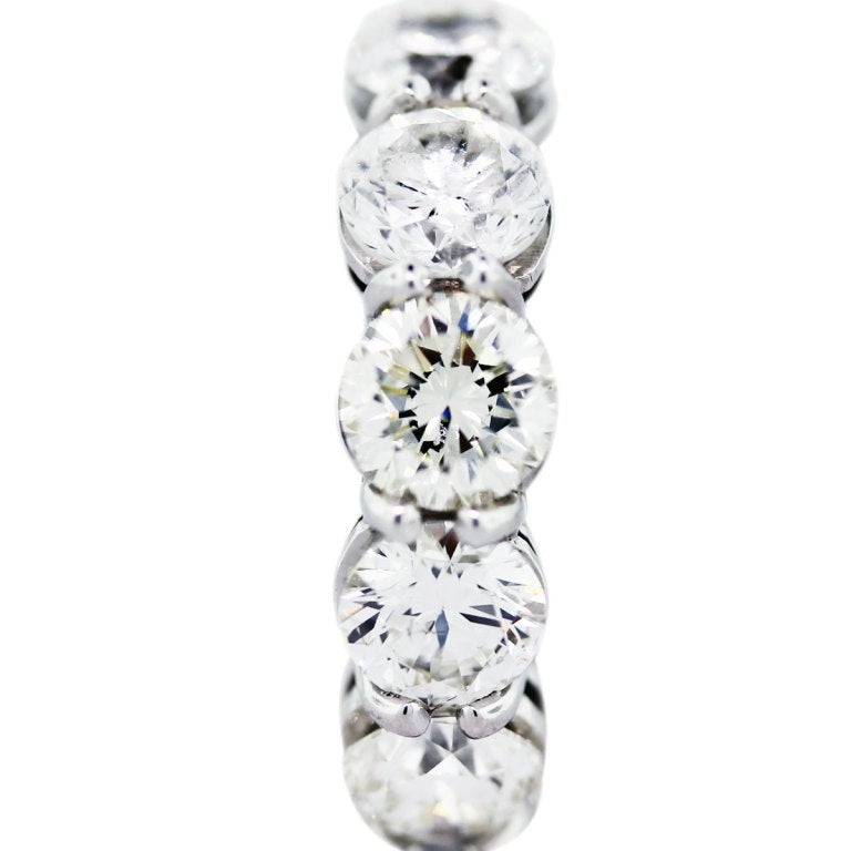 Beautiful Eternity Ring with 12 Round Brilliant Cut Diamonds.  11 Carats Total Weight.  Diamonds are H/I in color, VS/SI in clarity.  Ring is Size 6 (cannot be sized)