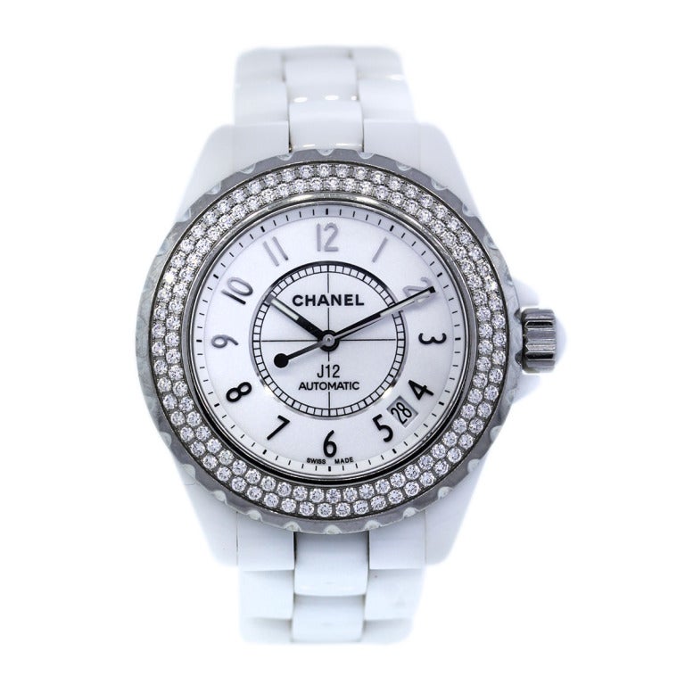 Chanel White Ceramic Wristwatch with Factory Diamond Bezel
 
White Dial with Arabic Numerals
White Ceramic Bracelet 
Stainless Steel Uni-Directional Diamond Bezel with Two Rows of Diamonds 
Will fit a 5.5