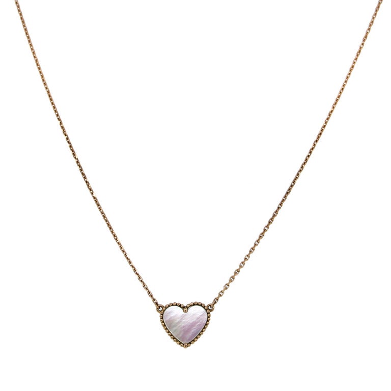 You are Viewing this Stunning Van Cleef & Arpels Mother of Pearl Heart Shaped Pedant on a Rose Gold Chain; Collection, Alhambra; Material, 18k Rose Gold; Gemstone, White Mother of Pearl; Pendant Measurements, Height: 11.60 mm; Width: 13.75 mm; Chain