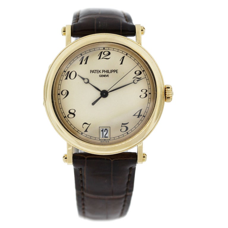 Patek Philippe Officer's Wristwatch with Date, Ref. 5053

Company: Patek Philippe
Reference Number: 5053
Case Material: 18k Yellow Gold
Movement: Automatic
Dial: Champagne-Color with Black Breguet numbers, Date at 3 O'Clock, Breguet