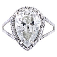 Pear Shaped Diamond Halo Style Pave Engagement Ring