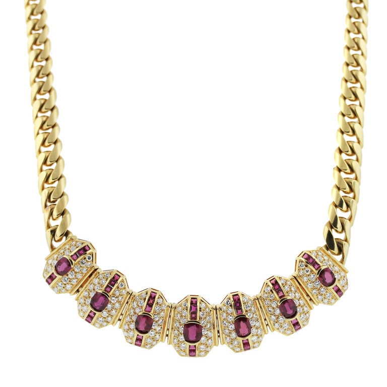You are viewing this Yellow Gold Ruby and Diamond Necklace. Material; 18K Yellow Gold. Rubies; 11.5ctw of Rubies. Diamonds; Approximately 7.61ctw of Round Diamonds. Diamond Color; F/G. Diamond Clarity; VS. Measurements; 16.5'' in Length. Total Item