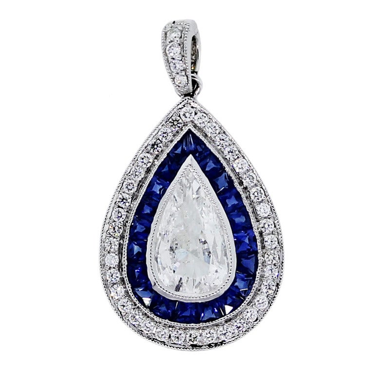 1.07 Carat Pear Shaped Sapphire Diamond Pendant in Platinum For Sale