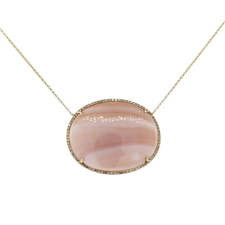 Style: Diamond Pink Mother of Pearl Pendant 14k Yellow Gold Necklace
Material: Pink Mother of Pearl and 14k Yellow Gold 
Measurements: (1.1