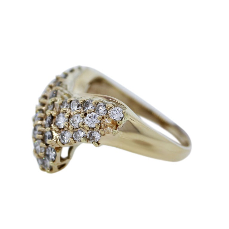 Style	: 14k Yellow Gold 1.60 carat Round Diamond V Ring
Material: 14k Yellow Gold
Diamond Details: Approximately 1.60 carats of Pave Set Diamonds
Diamond Color: G/H
Diamond Clarity: SI
Total Weight: 4.1dwt (6.4g)
Size: 6.75 (Can Be Sized)