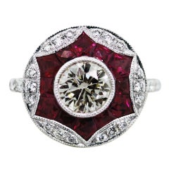 Round Diamond, Ruby and Platinum Engagement Ring