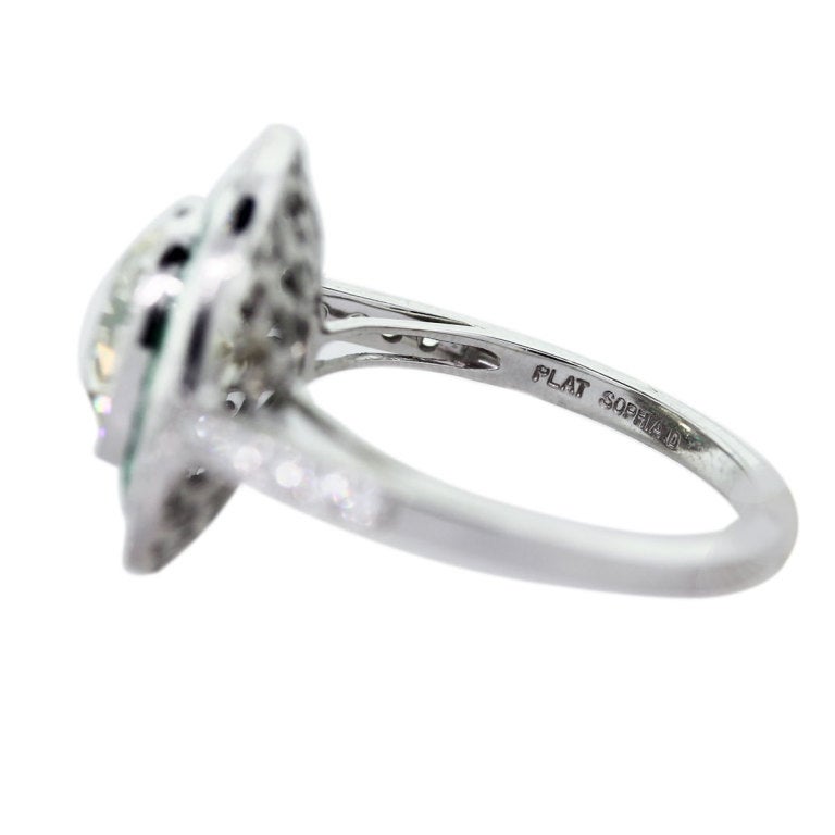 Diamond, Platinum and Emerald Engagement Ring 1