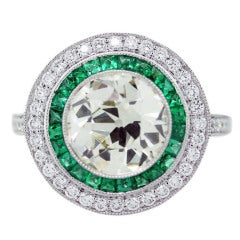 Diamond, Platinum and Emerald Engagement Ring